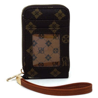 Black patterned wallet with brown strap on a white background