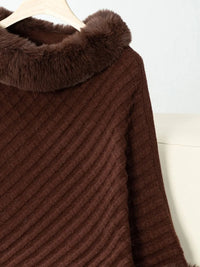 Brown textured fabric with fur trim on a white background