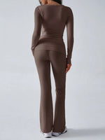 Brown long-sleeve top and pants set on a white background