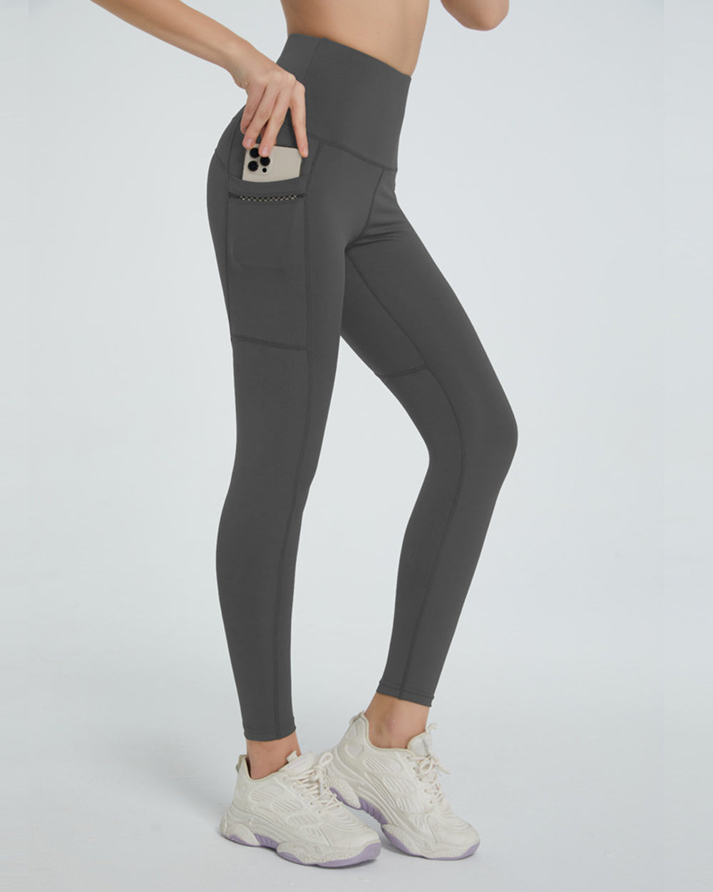 Side view of pocket on gray High Waist Active Leggings – Bold Colors
