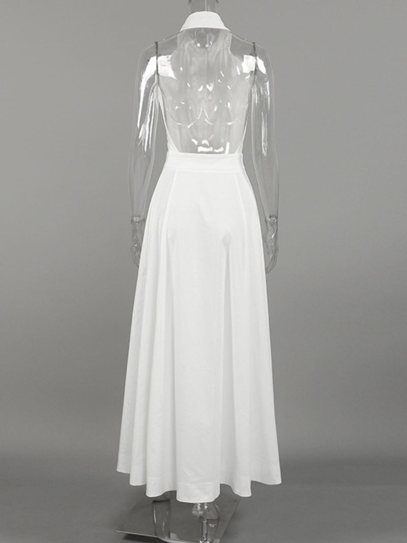 White dress with sheer sleeves on a gray background