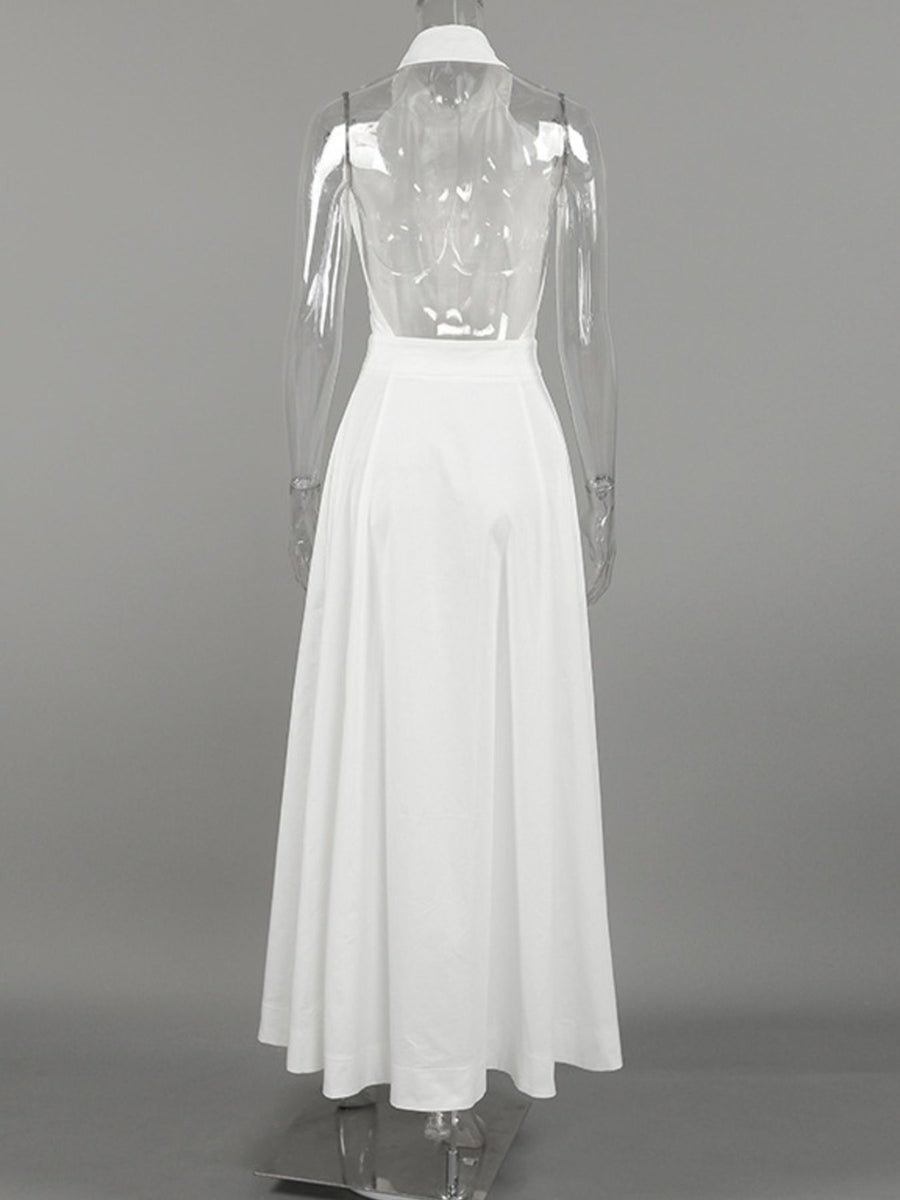 White dress with sheer sleeves on a gray background