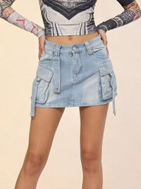 Denim skirt worn by a person on a beige background