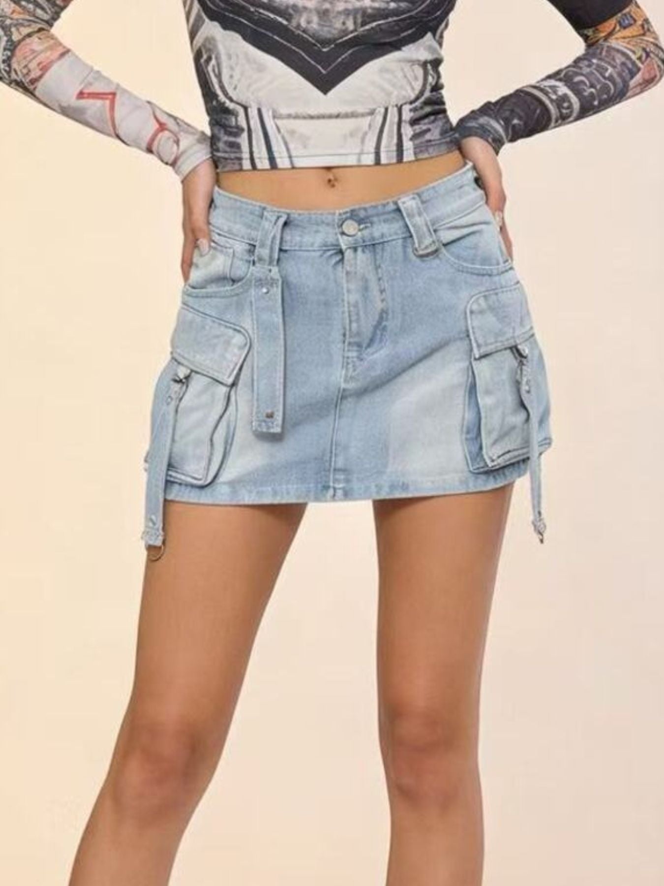 Denim skirt worn by a person on a beige background