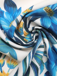 Close-up of blue and yellow floral fabric pattern