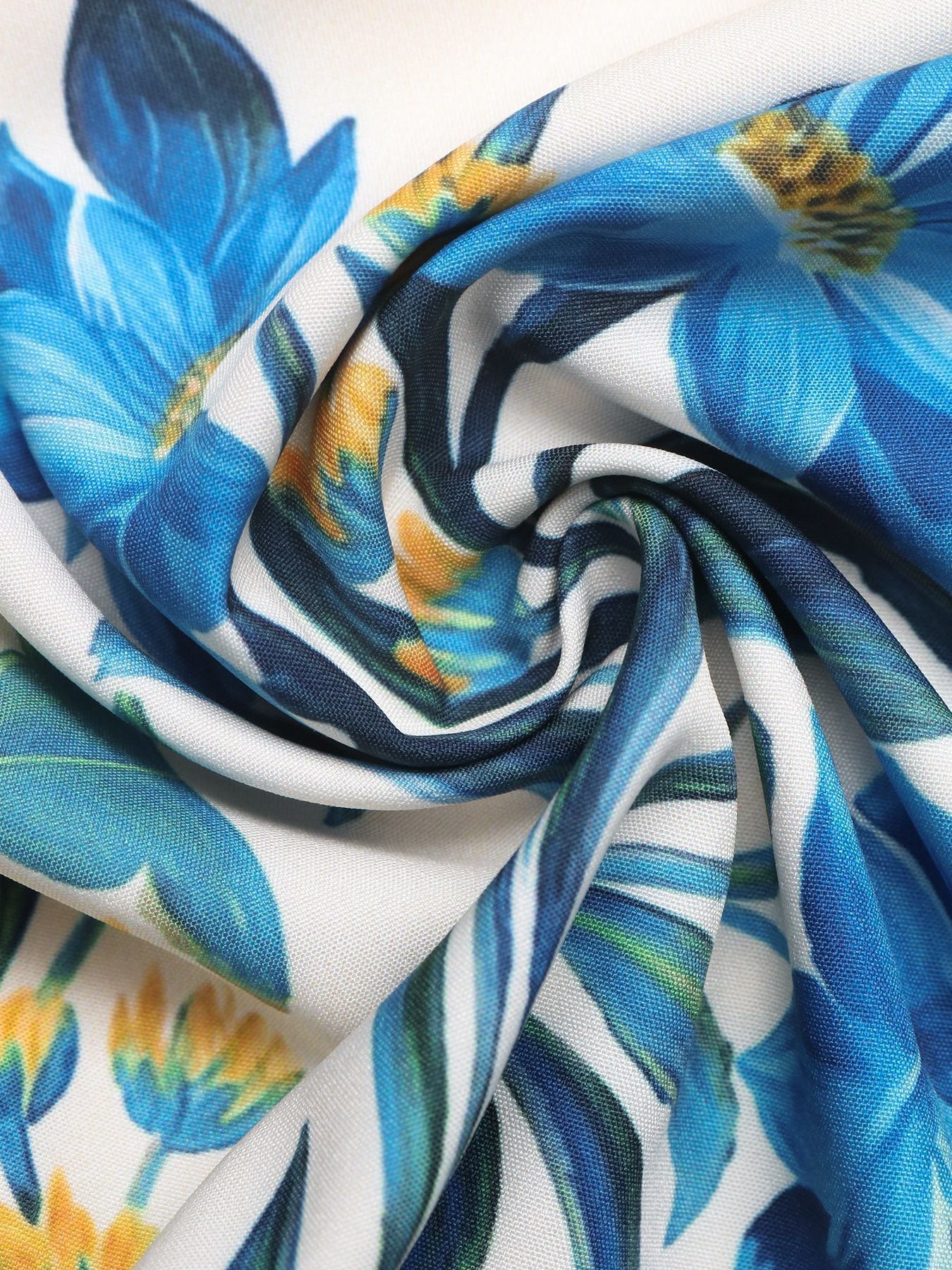 Close-up of blue and yellow floral fabric pattern