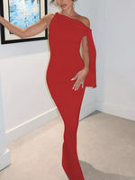 Woman wearing a red one-shoulder dress in an indoor setting.