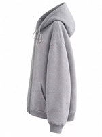A light gray heather zip-up hoodie shown from a side profile view against a plain white background.