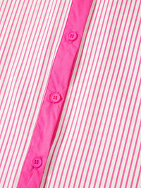 Close-up of a pink and white striped shirt with button details.