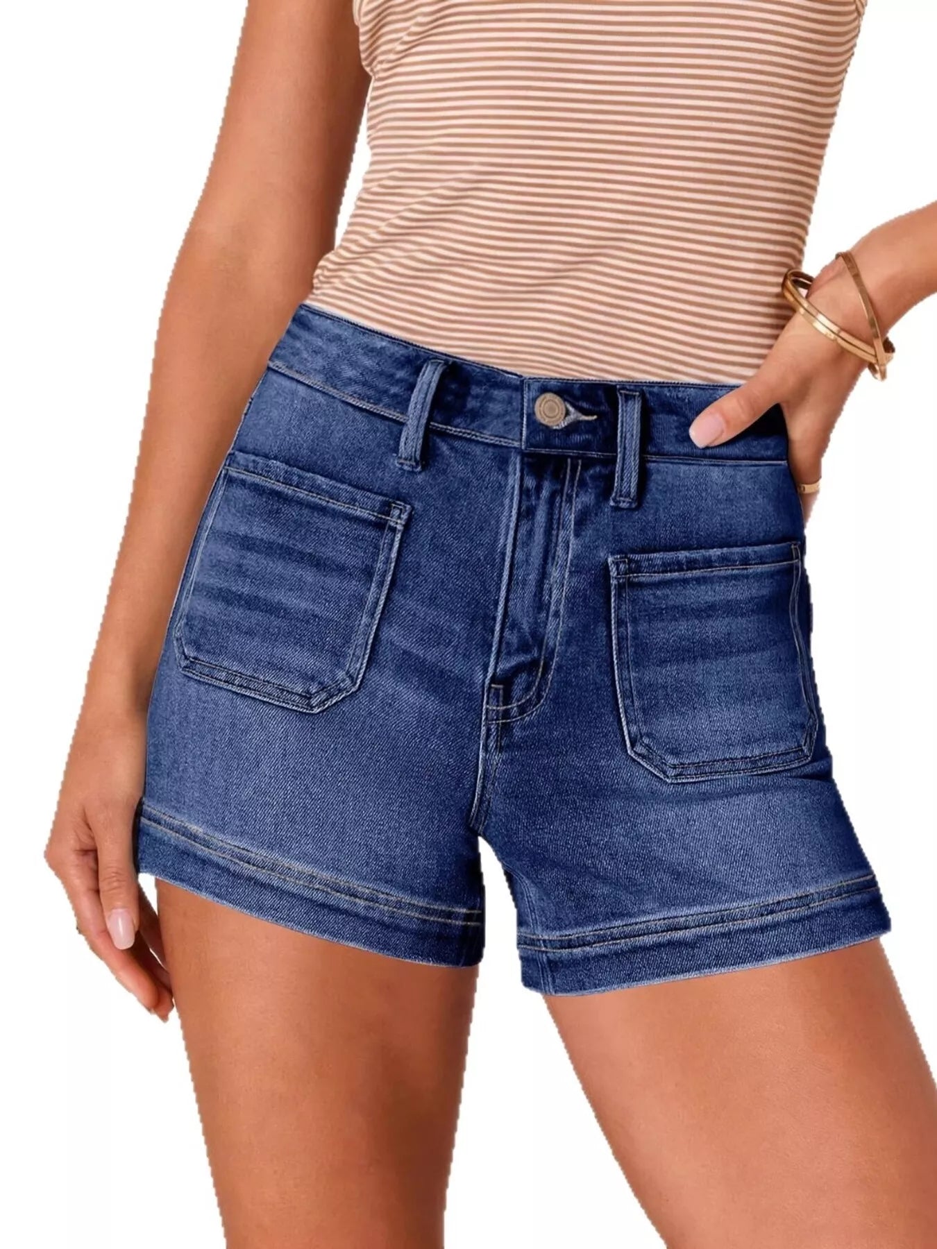 Blue denim shorts worn by a person on a white background