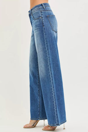 Blue wide-leg jeans on a white background