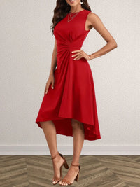 Woman wearing a red dress against a plain background