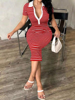 Woman in a red and white striped dress sitting on a chair.