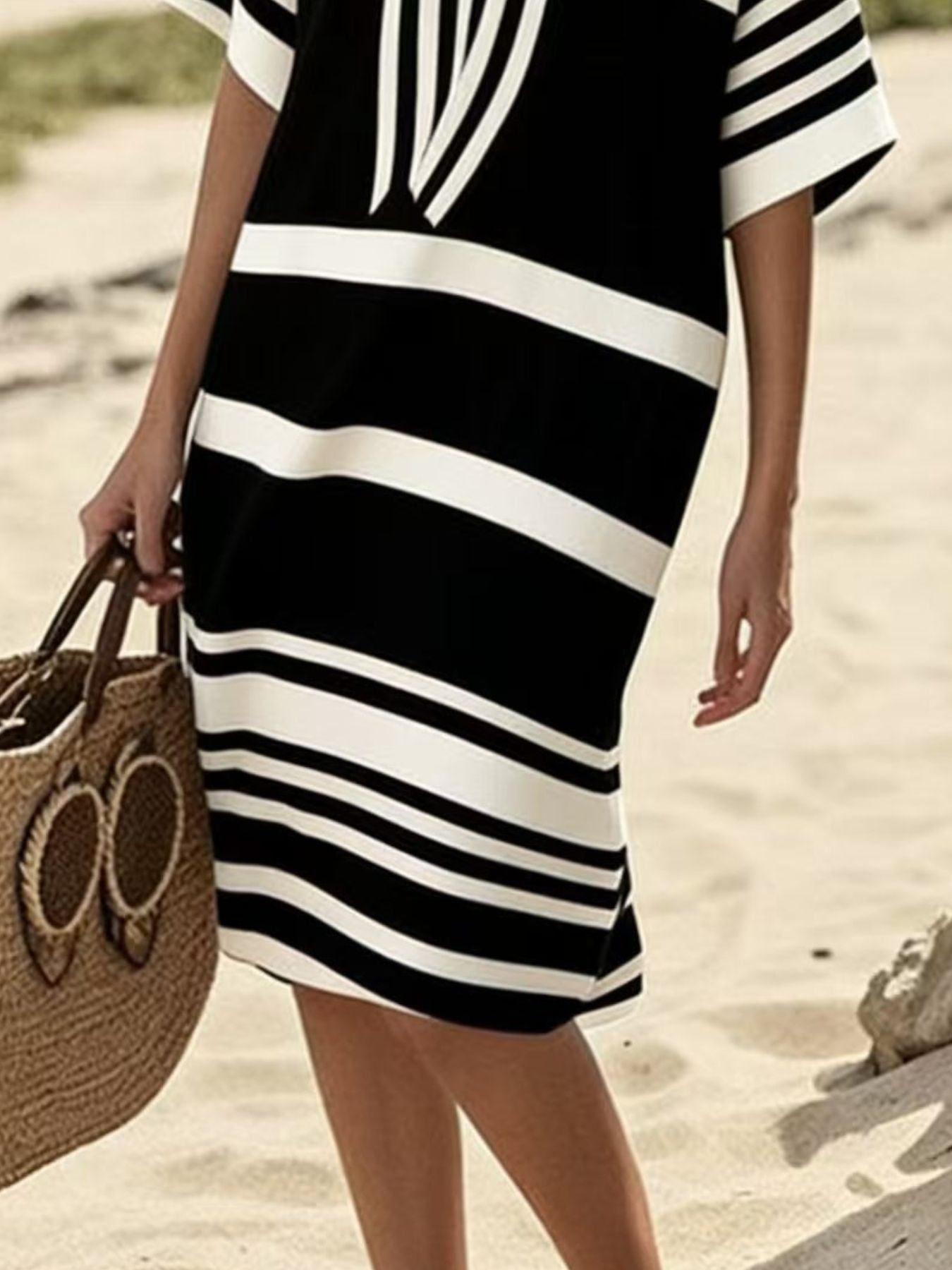 Close up of black and white striped dress