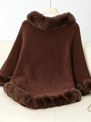 Brown fur-trimmed poncho on a white background