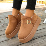 Woman showing A pair of baige Round Toe Platform Boots 