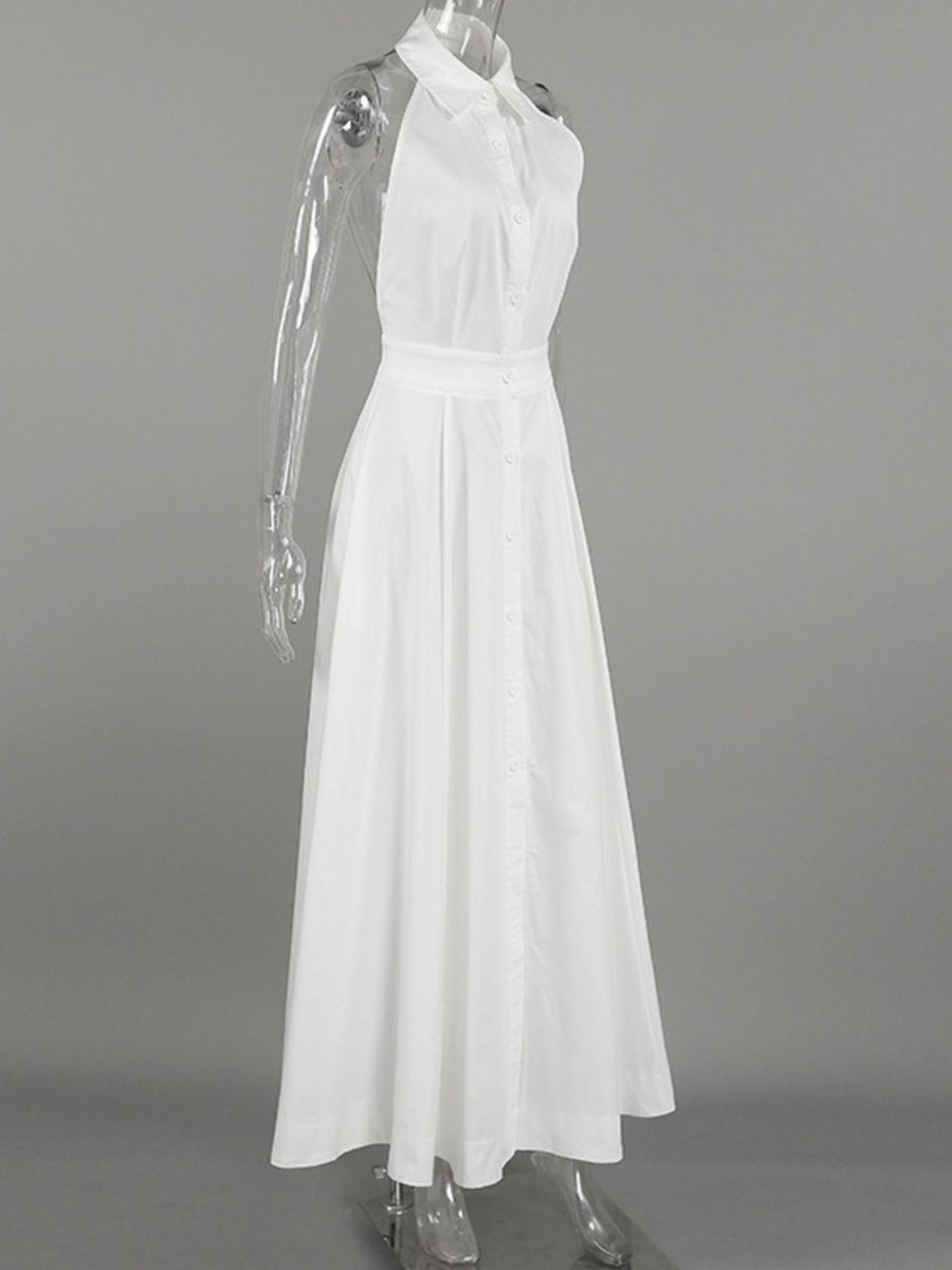White dress on a mannequin against a gray background