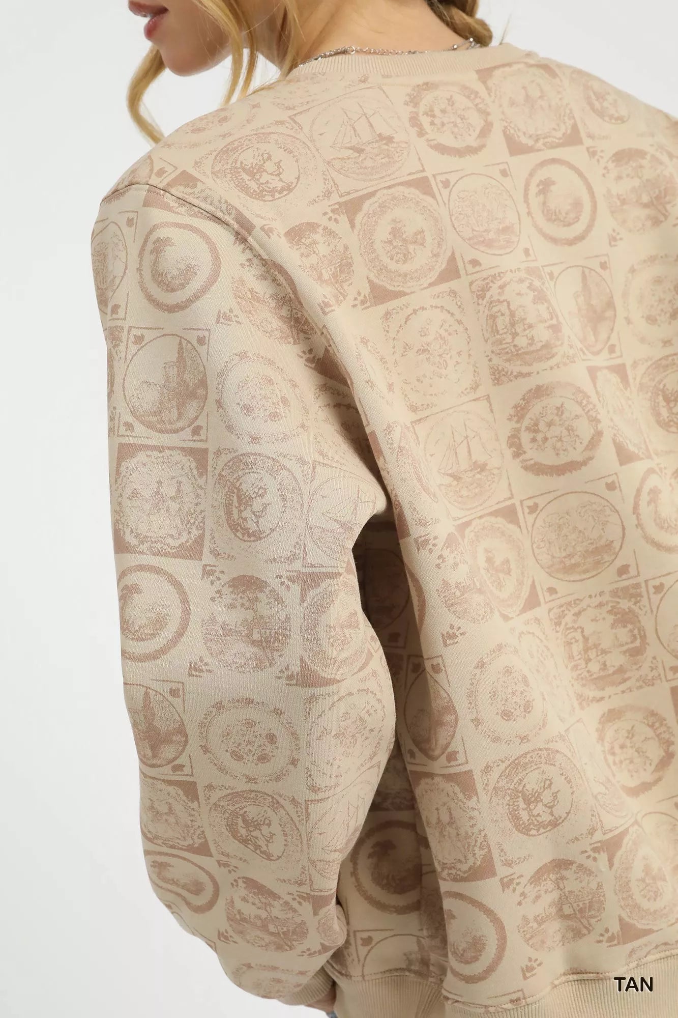 Beige patterned garment with a plain background