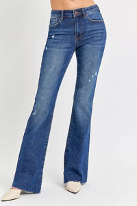 Blue flared jeans on a white background
