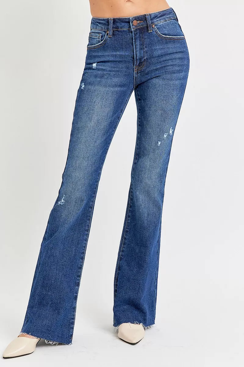 Blue flared jeans on a white background