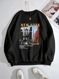 Black sweatshirt with New York and Chicago text and graphics on a white background