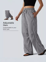 Model showing pocket of High-Waisted Gingham Wide-Leg Drawstring Pants For Women
