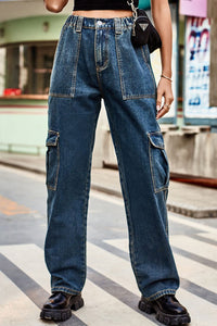 Person wearing blue jeans on a city street