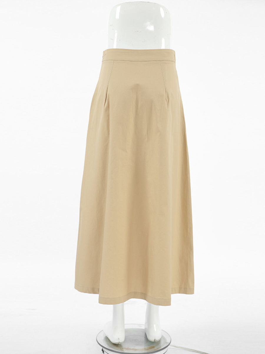 Beige skirt on a mannequin against a white background