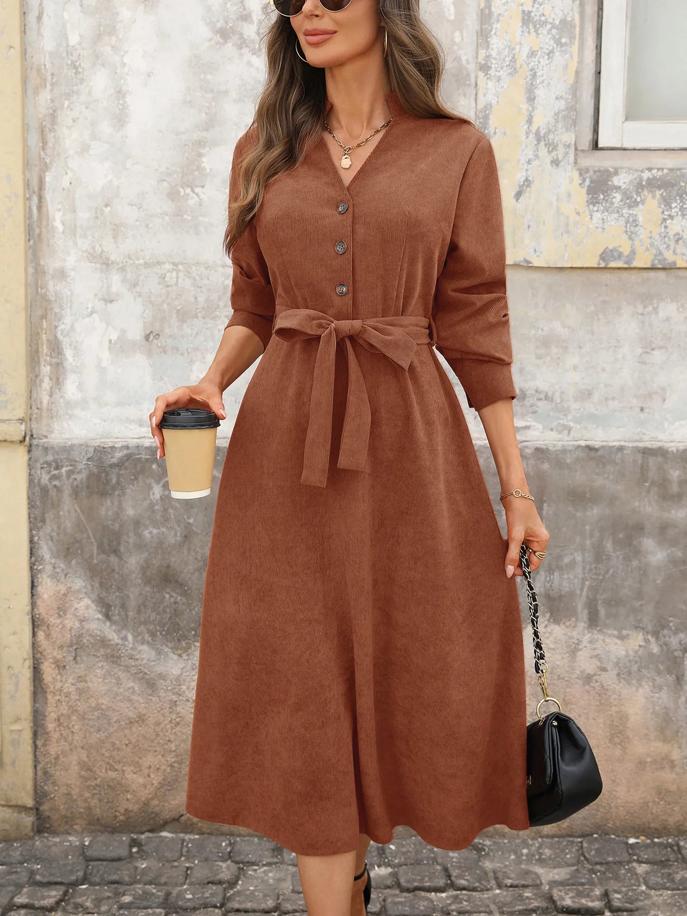 Woman walking down the street in Max-Origin dress