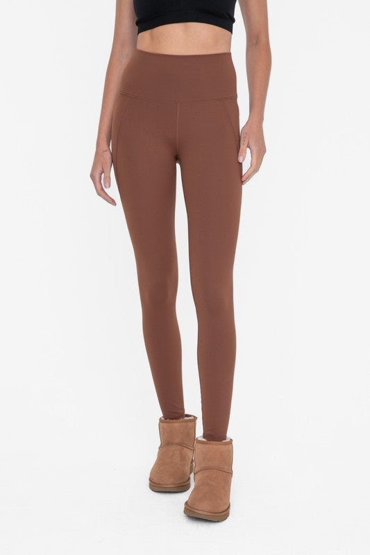 Central view of Tapered Band Essential Solid Highwaist Leggings cocoa dust