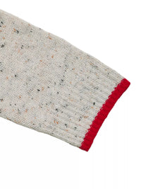Textured glove with red cuff on a white background