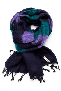 Plaid scarf with purple and green pattern on a white background