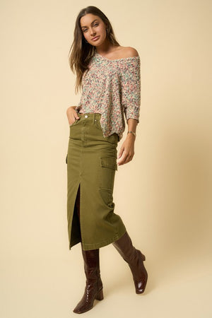 Lady showing COLOR CARGO MIDI SKIRT-green