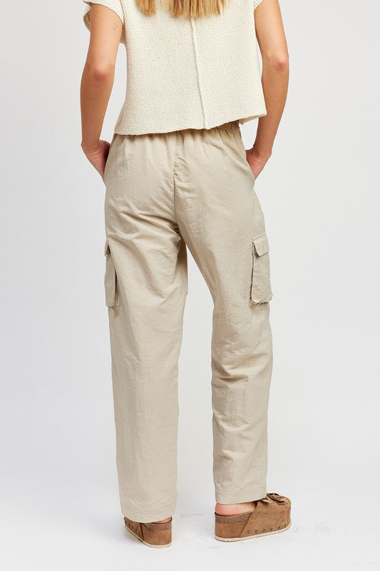 Back view of taupe color STRAIGHT LEG PANTS WITH ELASTIC WAIST BAND