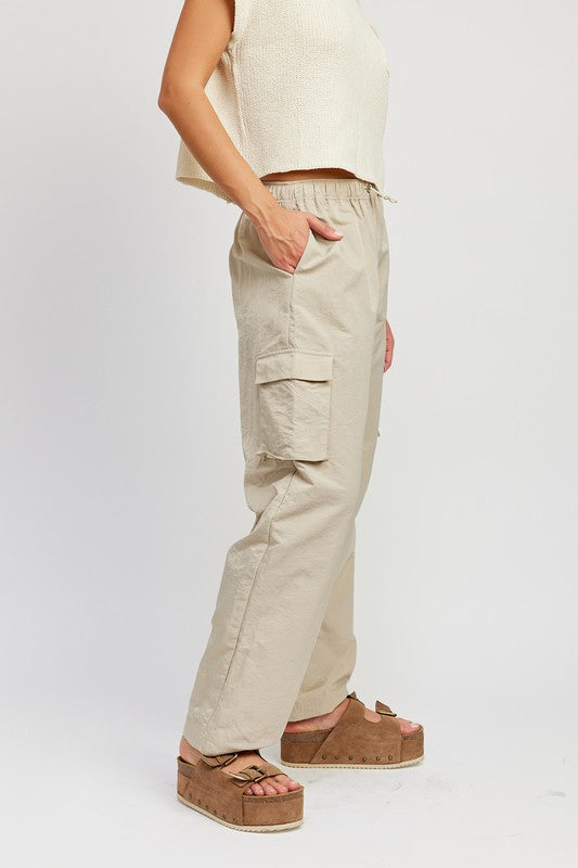 left side view of taupe color STRAIGHT LEG PANTS WITH ELASTIC WAIST BAND