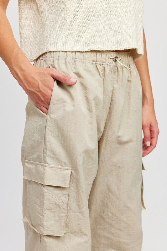 close up view of taupe color STRAIGHT LEG PANTS WITH ELASTIC WAIST BAND