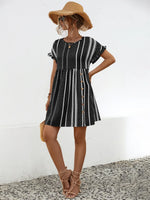 Woman wearing a straw hat and Striped Polka Dot Frill Short Sleeve Mini Dress 