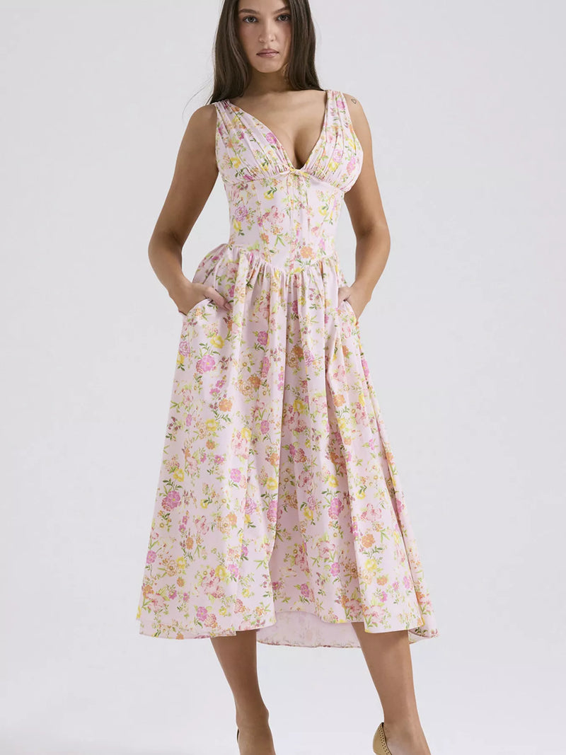 Woman wearing a floral dress on a white background