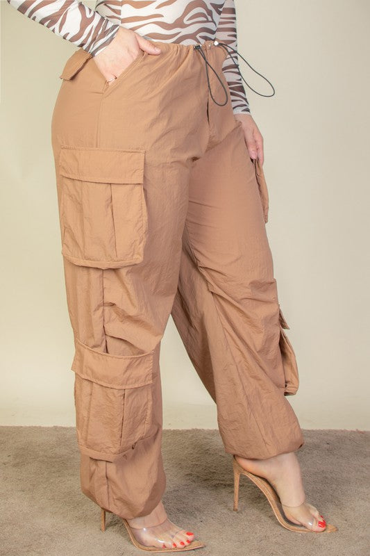 side view of Plus Flap Pockets Drawstring Parachute Pants brown