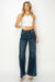 Model showing waist of HIGH RISE RELAXED WIDE LEG JEANS