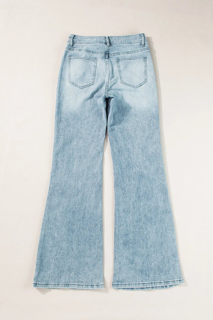 Light blue jeans on a white background