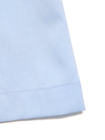 Light blue fabric corner on a white background
