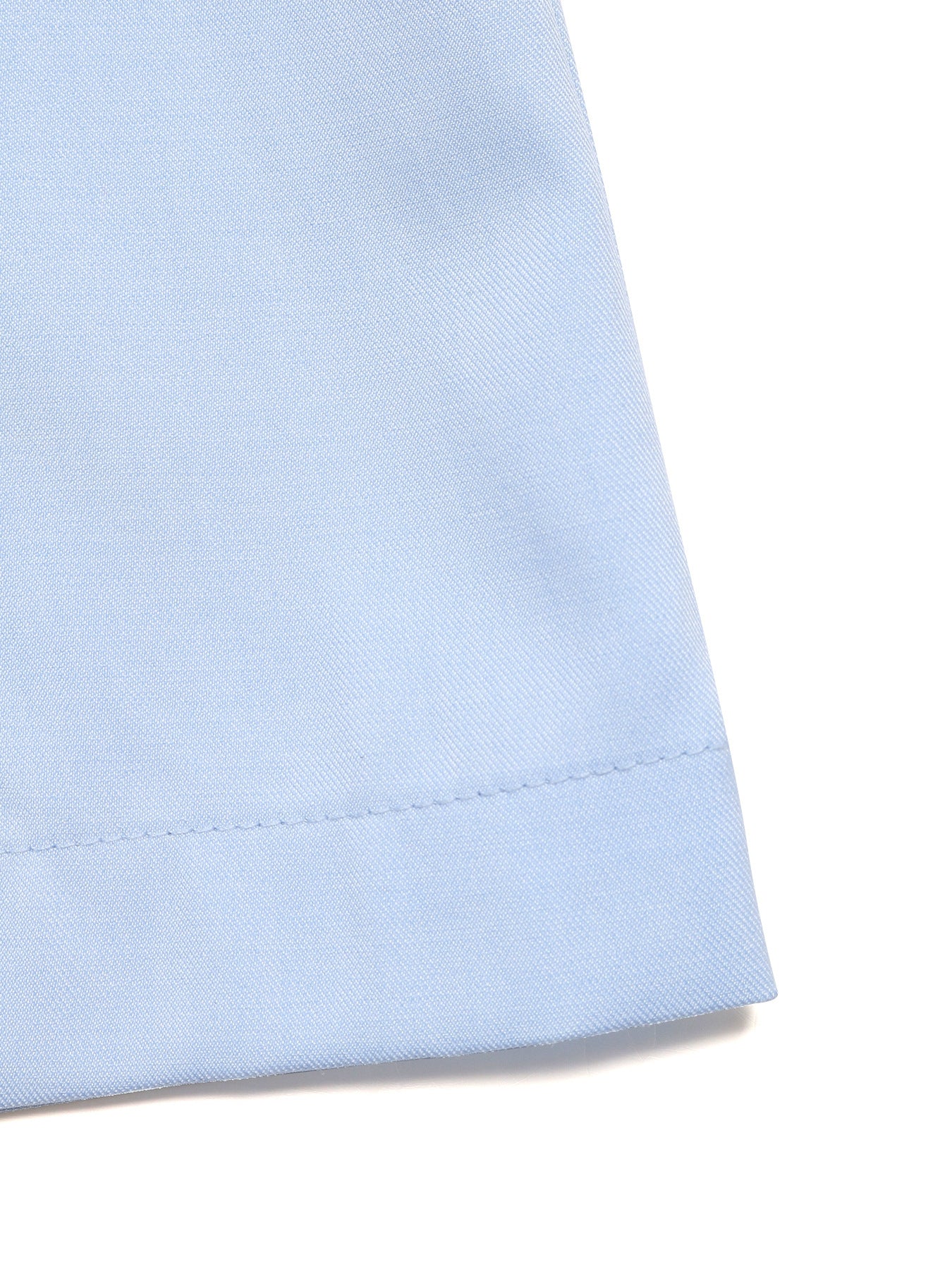 Light blue fabric corner on a white background