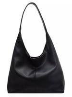 Black leather handbag on a white background