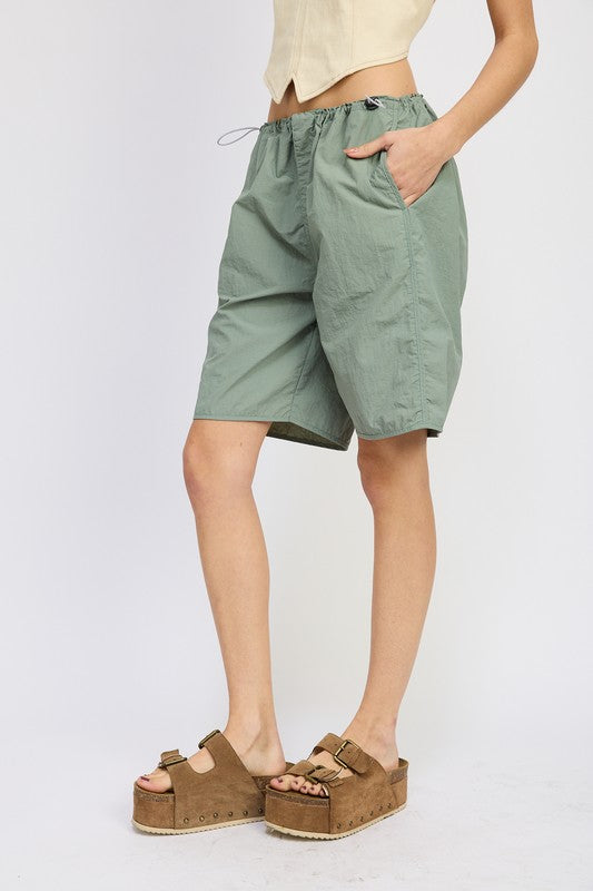 Left side view of CONTRASTED BERMUDA SHORTS