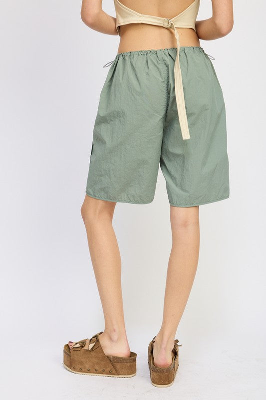 Back view of CONTRASTED BERMUDA SHORTS