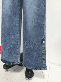 Blue acid-wash jeans on a stand against a white background