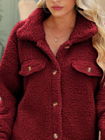 Close up view of red Button Down Collared Coat