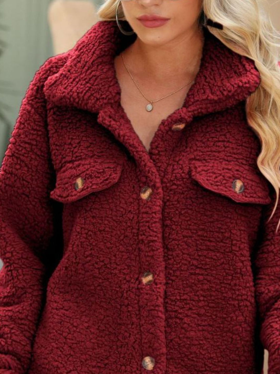 Close up view of red Button Down Collared Coat