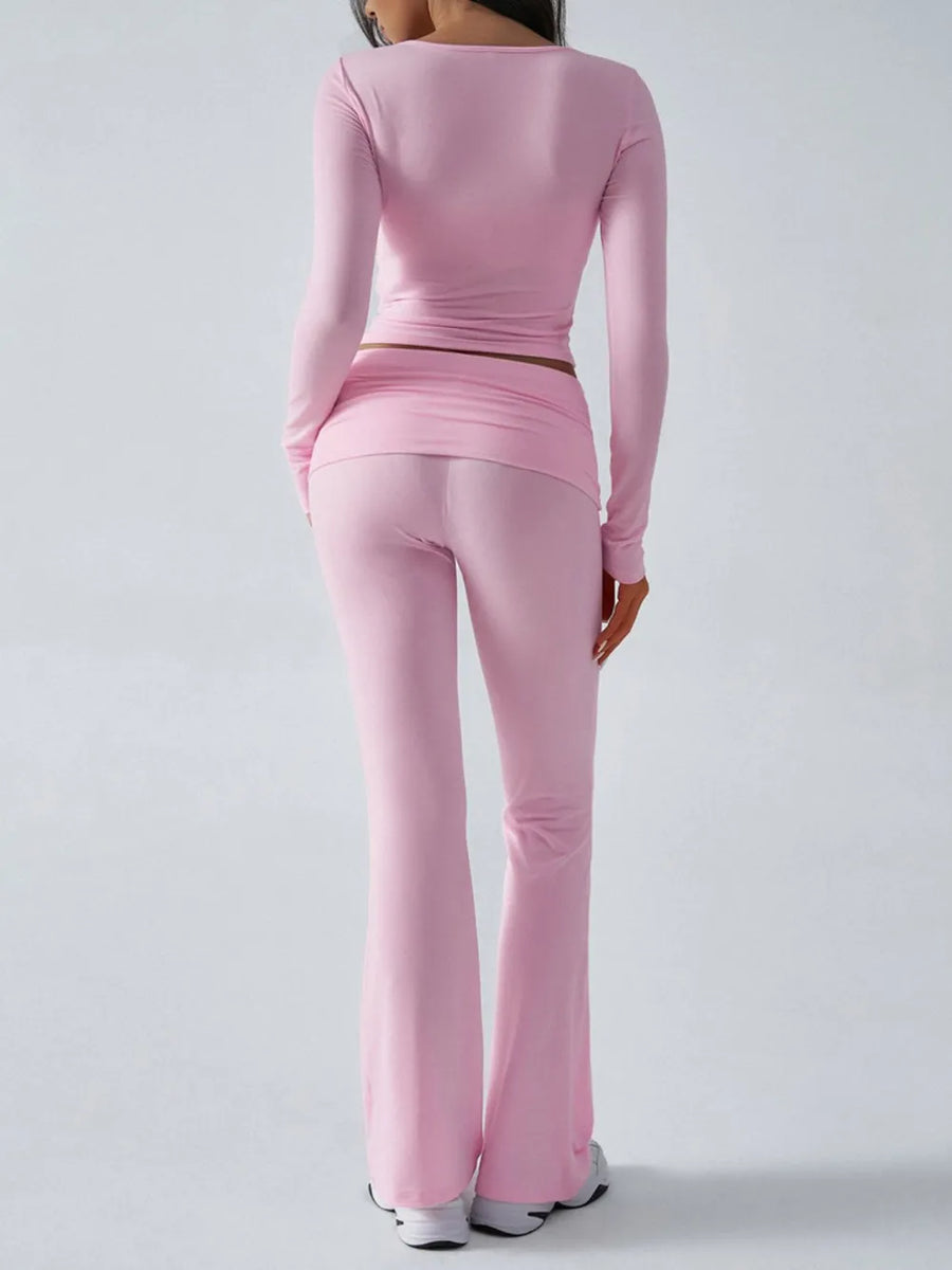 Person wearing a pink athletic outfit on a white background